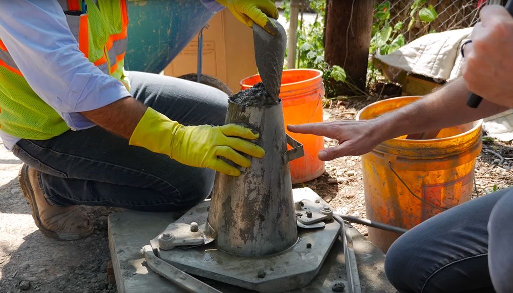 Filing the Concrete Slump Cone With Fresh Concrete